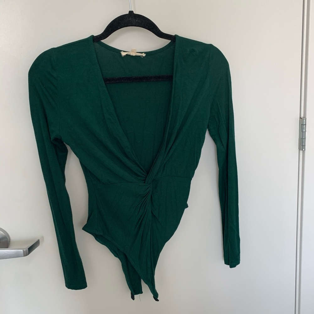 emerald green low v neck body suit